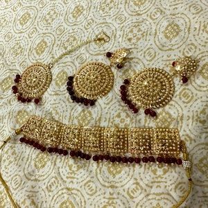 Indian traditional Maroon color party wear necklace set with earrings and tikka